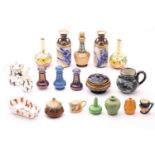 A mixed lot of ceramic miniatures, including a pair of Doulton faience bulbous vases, 9cm high; pair