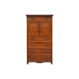 A Swedish Arts & Crafts walnut tallboy compactum, the upper section with a pair of panel cupboard