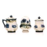 William Moorcroft for James MacIntyre, a miniature condiment set, 'Anemone' pattern, including a