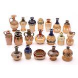 Ninteen Doulton stoneware miniature vases and flagons, largest 8.5cm highQty: 19