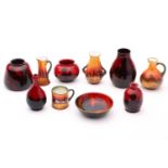 Six Royal Doulton flambe miniature vases and circular dish, and four Royal Doulton Sunset