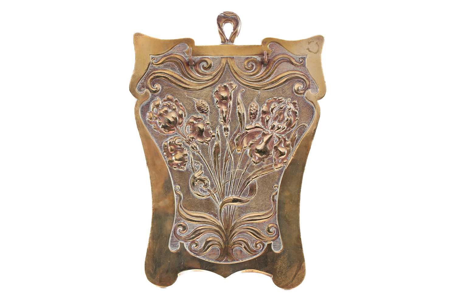 An early 20th century Art Nouveau brass and copper key holder/wall bracket, with embossed floral