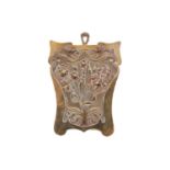 An early 20th century Art Nouveau brass and copper key holder/wall bracket, with embossed floral
