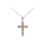 A diamond set cross; comprising eleven slightly graduated round brilliant cut diamonds in claw