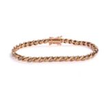 A diamond-set twisted rope bracelet, alternating in brown and colourless circular-cut diamonds