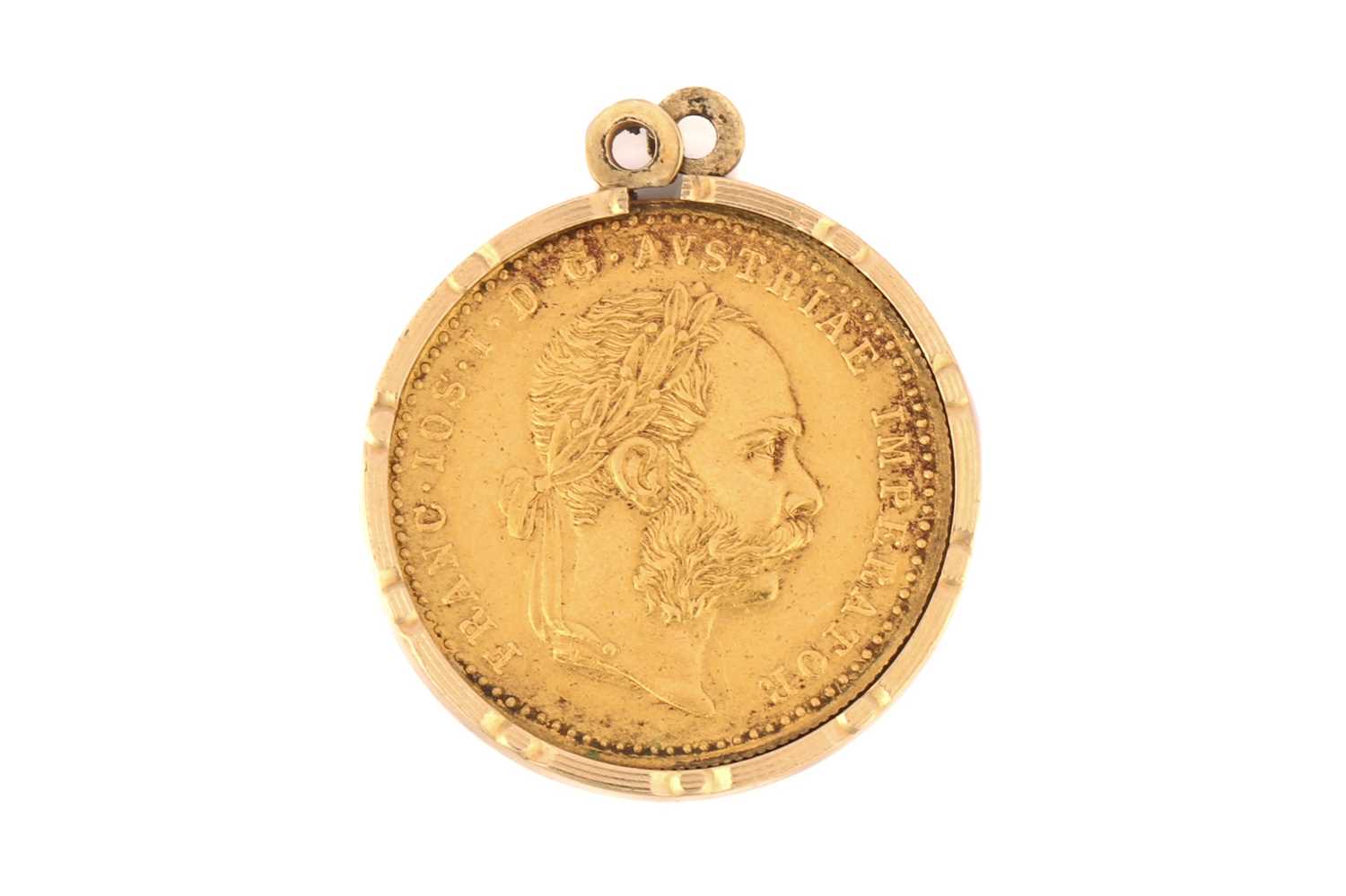 An Austrian 1 Ducat coin in a yellow metal pendant mount, 1915, total weight of item 4.6 grams.