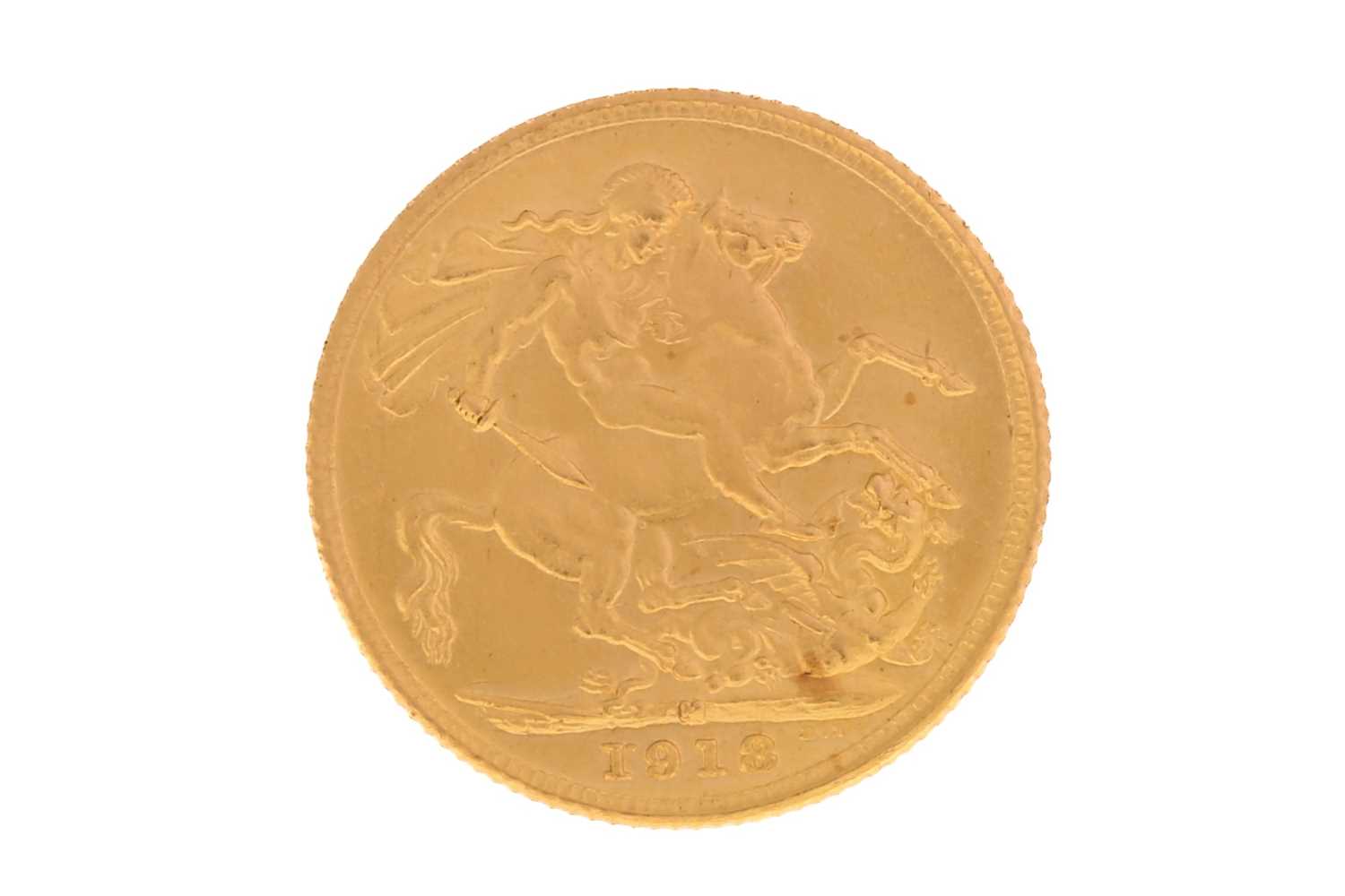 A George V full sovereign, 1918, 7.9 grams.