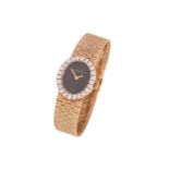 A 9ct yellow gold Bueche-Girod diamond set lady's watch, featuring a hand-wound Swiss-made