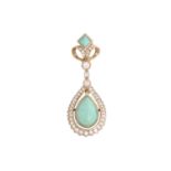 A turquoise and diamond pendant, composed of a pear-shaped turquoise cabochon in millgrain collet,