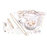 A quantity of assorted base metal costume jewellery including nineteen bangles of various designs,