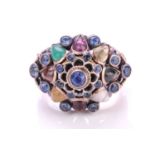 A multi-gem set Noppakao Thai princess ring, the domed ring head has set with layers of