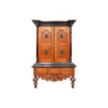A 19th-century style Sri Lankan ebony and padauk wood cabinet, 20th century, with moulded cornice
