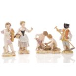 Four Meissen figures, including one of two putti laying bricks, impressed 107, 9.5 cm high,