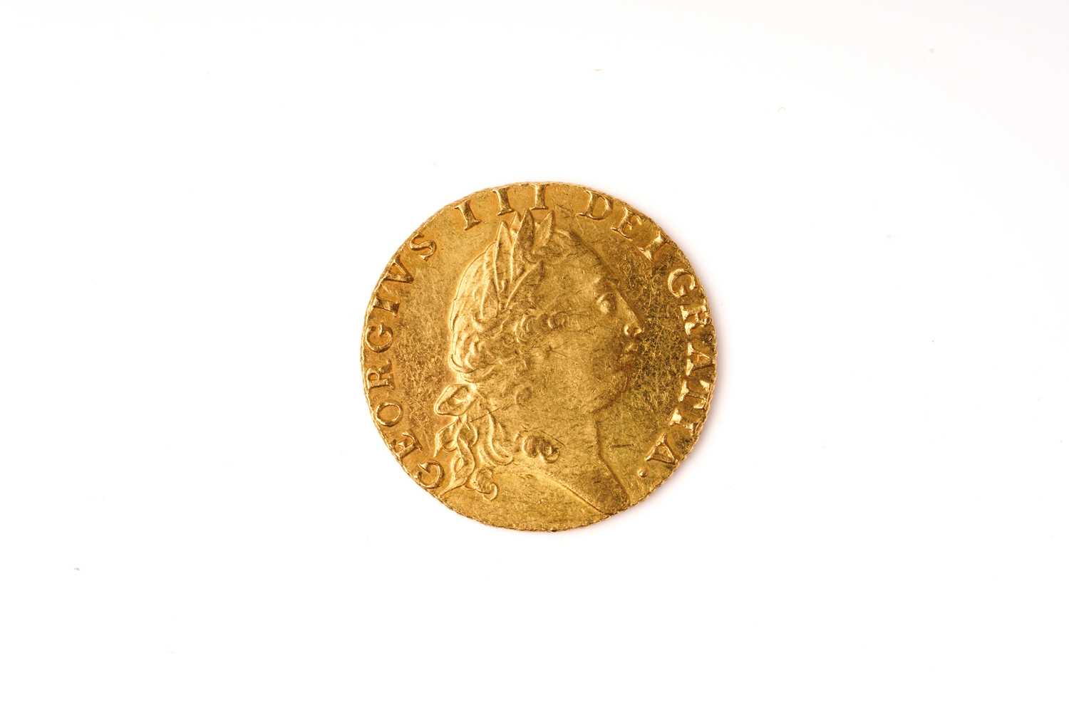 Geo III gold guinea, 1791, fifth laur. bust right, rev. crowned 'spade' shield. VFVF. No mounting