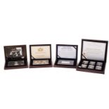 Four commemorative coin sets, comprising The First & Last Strike of the Guinea, No; 139/495; the New