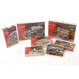 A collection of boxed (and largely sealed) Faller HO Gauge model railway building kits, comprising
