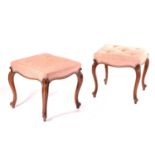 A pair of Victorian walnut dressing stools with square stuff over seats and moulded cabriole legs.