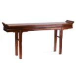 A Chinese elm (Yumu) rectangular altar table, ealy 20th century, with everted scroll ends and simple