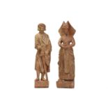 Pair of carved figures, possibly limewood, depicting a Knight and a maiden, the Knight with Clubs
