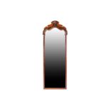 A Queen Anne style walnut framed pier glass/ wall mirror, early 20th century, with arched cresting