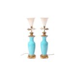 A pair of turquoise glaze table lamps with gilt metal mounts, with later electric fittings, 52 cm