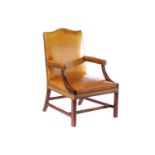 A George III style mahogany camel backed Gainsborough library armchair, 20th century, with green/tan