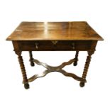 A William and Mary single drawer side table with bobbin and fillet legs united by a shaped stretcher