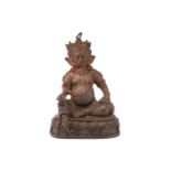 A patinated bronze figure of a seated Manjusri with Nakula at his left hand and a lotus pod in his