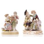 A Meissen figure group of two children with a cage and garland of flowers, cross swords and
