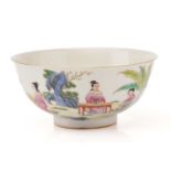 A Chinese porcelain bowl, painted with ladies in a garden setting playing Go and the Qin,