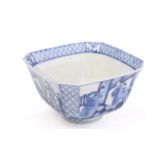 A Chinese blue and white porcelain canted square section bowl the interior painted with boys a