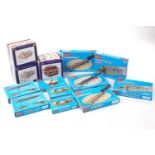 Three boxed Bachmann Branch-Line OO Gauge model railway trackside buildings, together with a