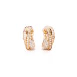 Cartier - A pair of 'Trinity' diamond hoop earrings, each comprising three intertwined bands in