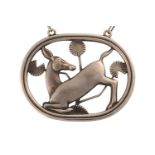 Georg Jensen - A necklace with kneeling deer and flowers, attached to a cable chain and toggle