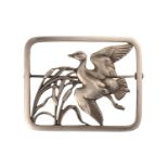 Georg Jensen - A rectangular openwork brooch in silver, depicting a duck flying above pond