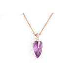 A single stone amethyst and diamond pendant; the faceted arrow-head shaped amethyst to a slightly