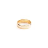 A plain 22 carat gold wedding band; plain curved section. Ring size P1/2; 7.76 grams
