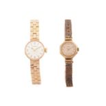Two lady's gold watches featuring a Buren with a hand-wound movement in a 9ct yellow gold case