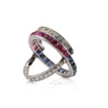 An Art Deco 'Night and Day' flip-over eternity ring, with half of the central band channel set