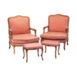 A pair of French Louis XV-style fauteuils and dressing stools, 29th century, with moulded frames and