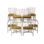 A set of four white painted bamboo "Cockpen" style conservatory side chairs with green slub-woven,