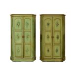 A matched pair of large Italianate green-painted two-door painted armadio (clothes cupboards),