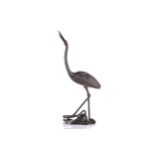 A Japanese bronze censer, Meiji period, modelled as a stork looking towards the heavens, its beak