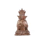 A Chinese Ming style gilt bronze figure of Guanyin, seated in vitarka mudra, of recent