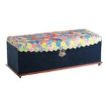 A large late Victorian velvet-covered Ottoman with an upholstered top and a decorative applied trade