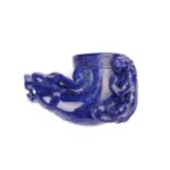 A Chinese carved lapis rhyton, the bowl with a band of leiwen before a dragons head, a chilong
