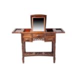 A Chinese solid Hongmu serpentine fronted kneehole dressing table, early 20th century, with