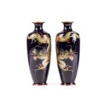 A pair of Japanese ginbari cloisonne vases, late Meiji/ early Taisho, each decorated with a writhing