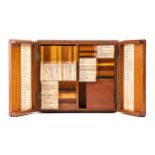 An early to mid-20th century collection of 39 exotic wood specimens, each labelled and with a