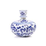 A Chinese porcelain Hookah pipe bowl, of Persian influence, painted in blue & white with leaves